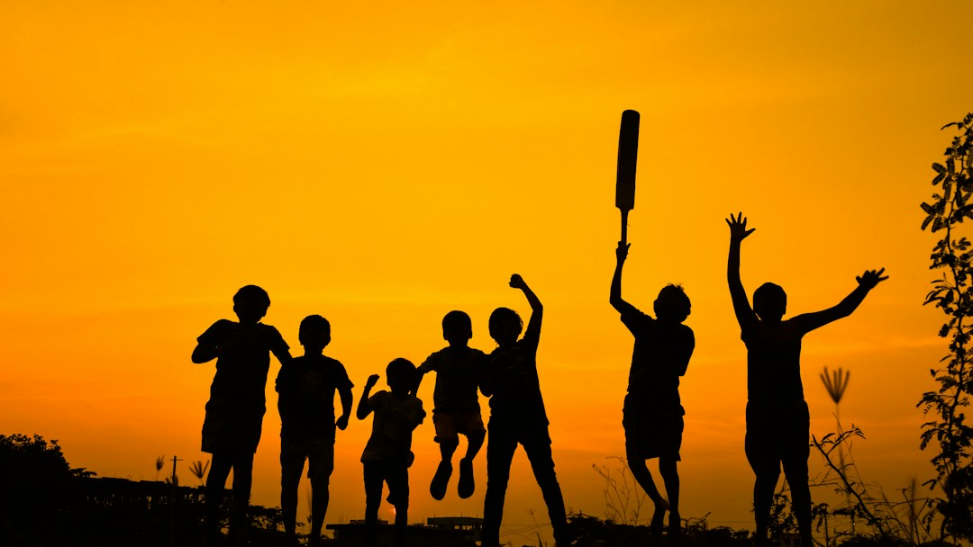 Cricket players celebrating after a match
